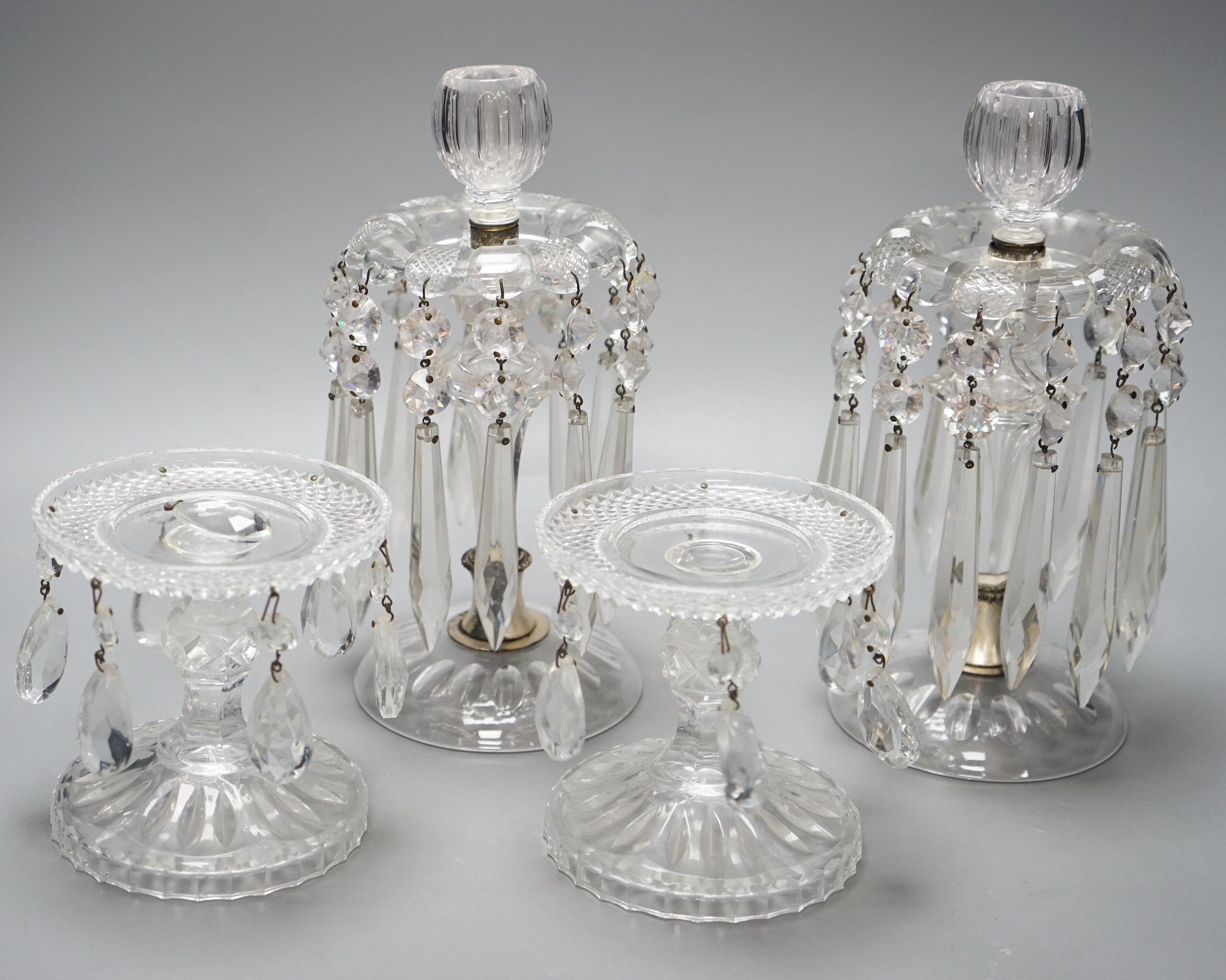 Two pairs of glass lustres, tallest 25cms high
